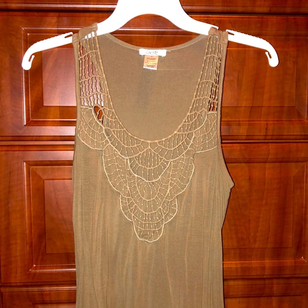 Small tank top with lace like design on chest